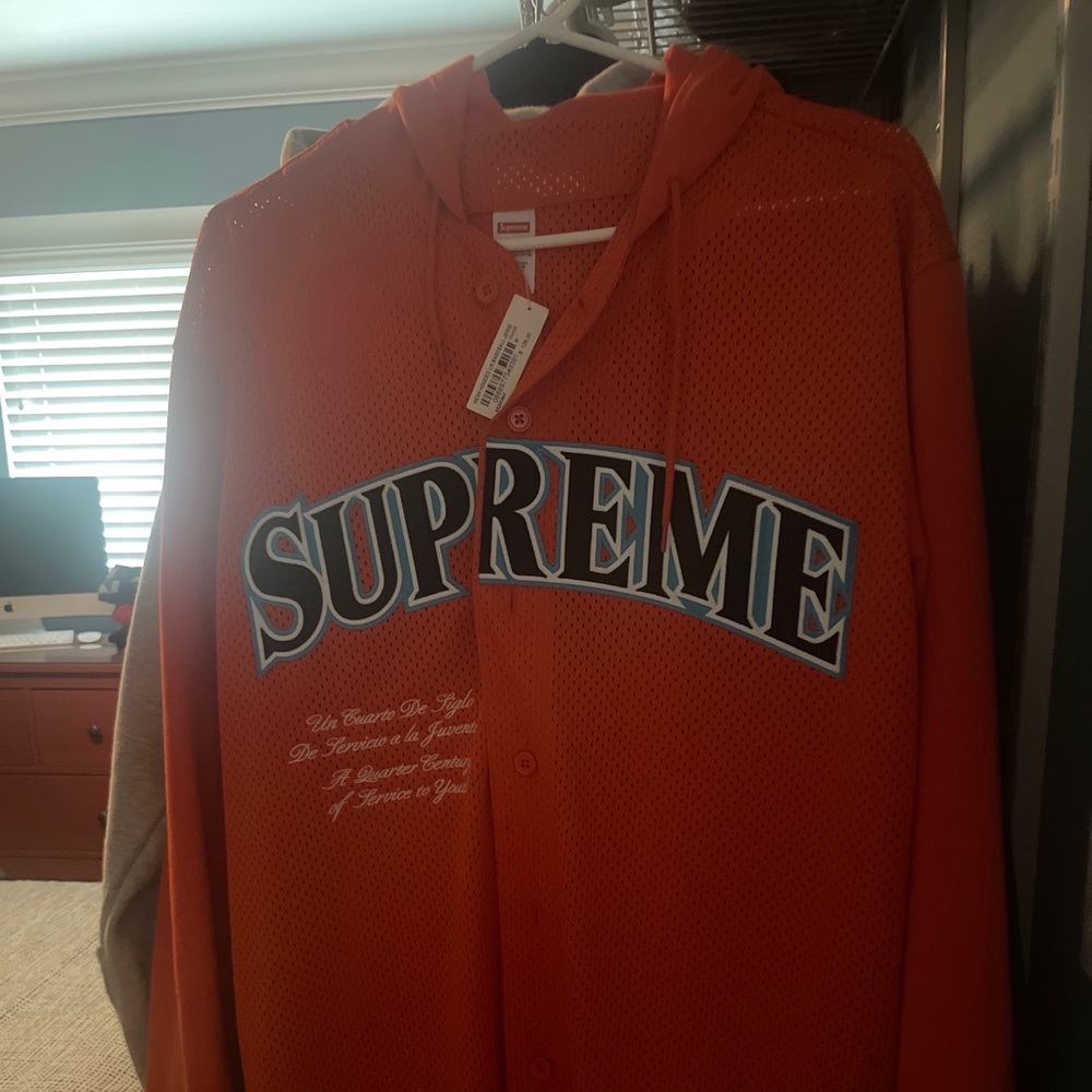 Supreme medium hooded baseball jersey, giants colors. Brand new never worn